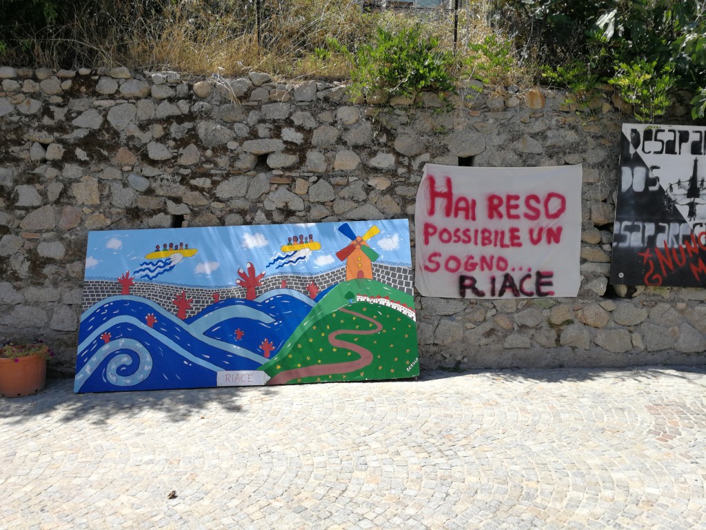 Una “soluzione finale” per Riace